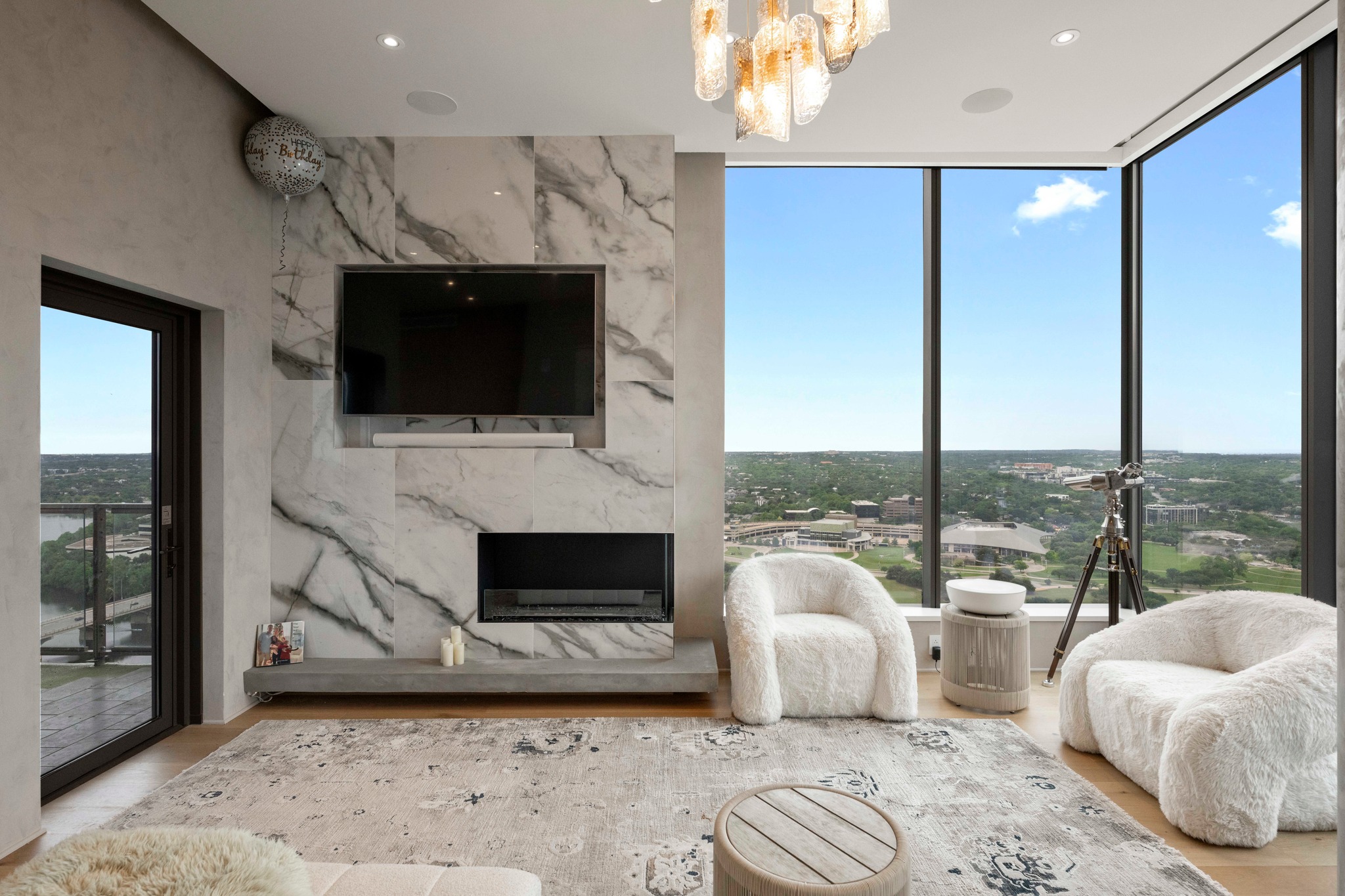 210 Lavaca Street, Unit 2706 Austin, TX 78701 - Photo 8 of 32 Floor-to-ceiling windows with expansive sky and distant city scenery