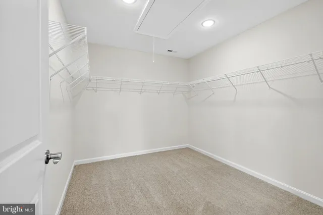 a view of a room with racks on the wall