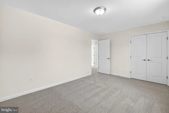 an empty room with an entryway