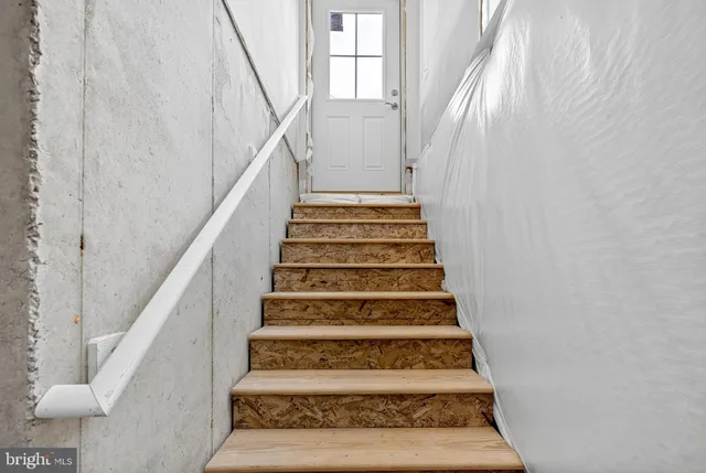 a view of a room with racks on the wall