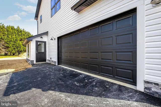 a view of balcony with wooden floor and fence