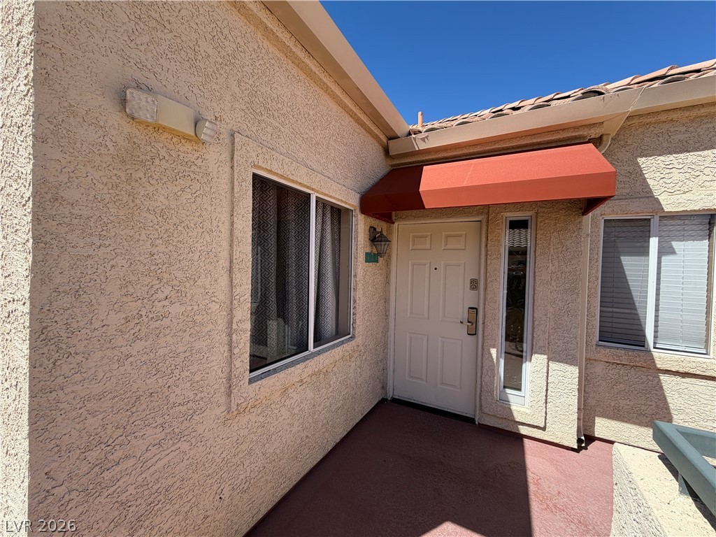 210 East Flamingo Road, Unit 426 Las Vegas, NV 89169 - Photo 1 of 17 An inviting entry welcomes guests with a protective awning and a sturdy front door.