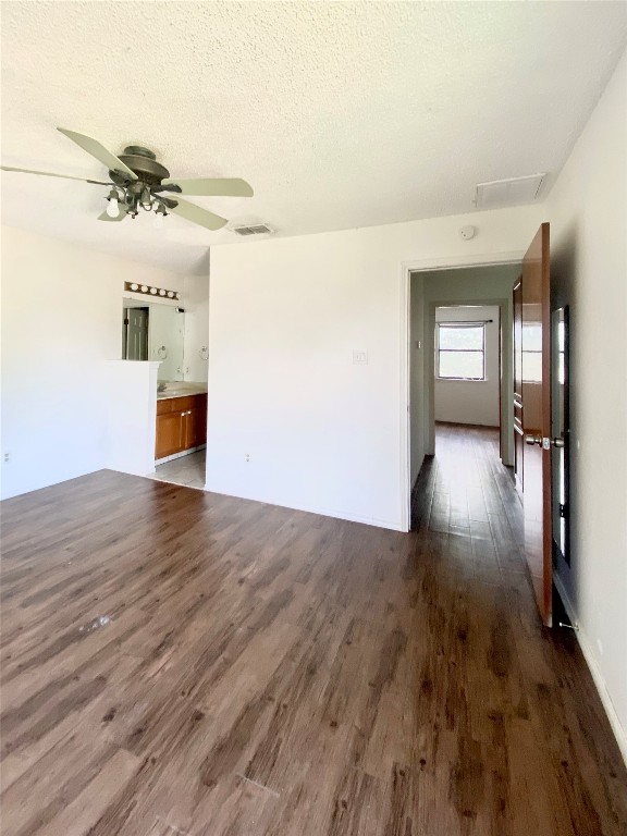 7808 Topawa Cove, Unit B Austin, TX 78729 - Photo 9 of 10 wooden floor in an empty room