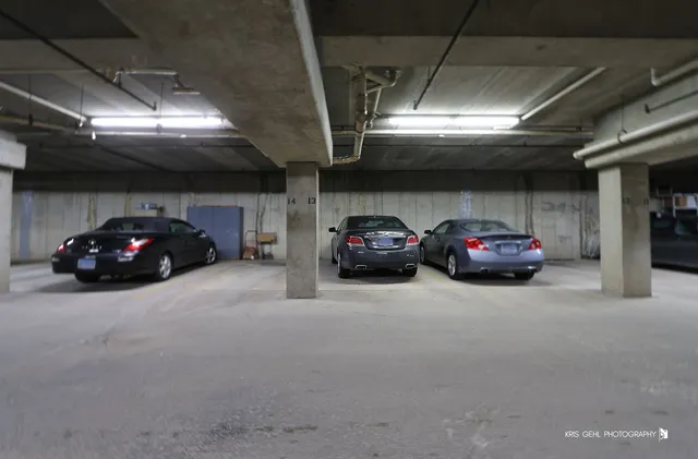 a view of balcony with wooden floor and fence