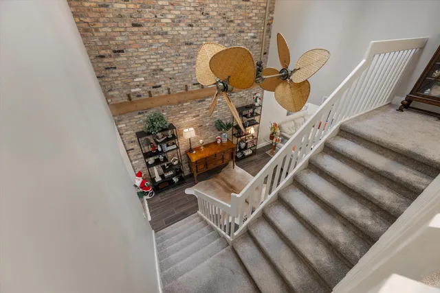 a view of a hallway with staircase