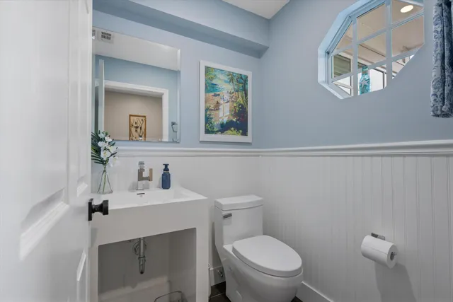 a bedroom with a bed and a walk in closet