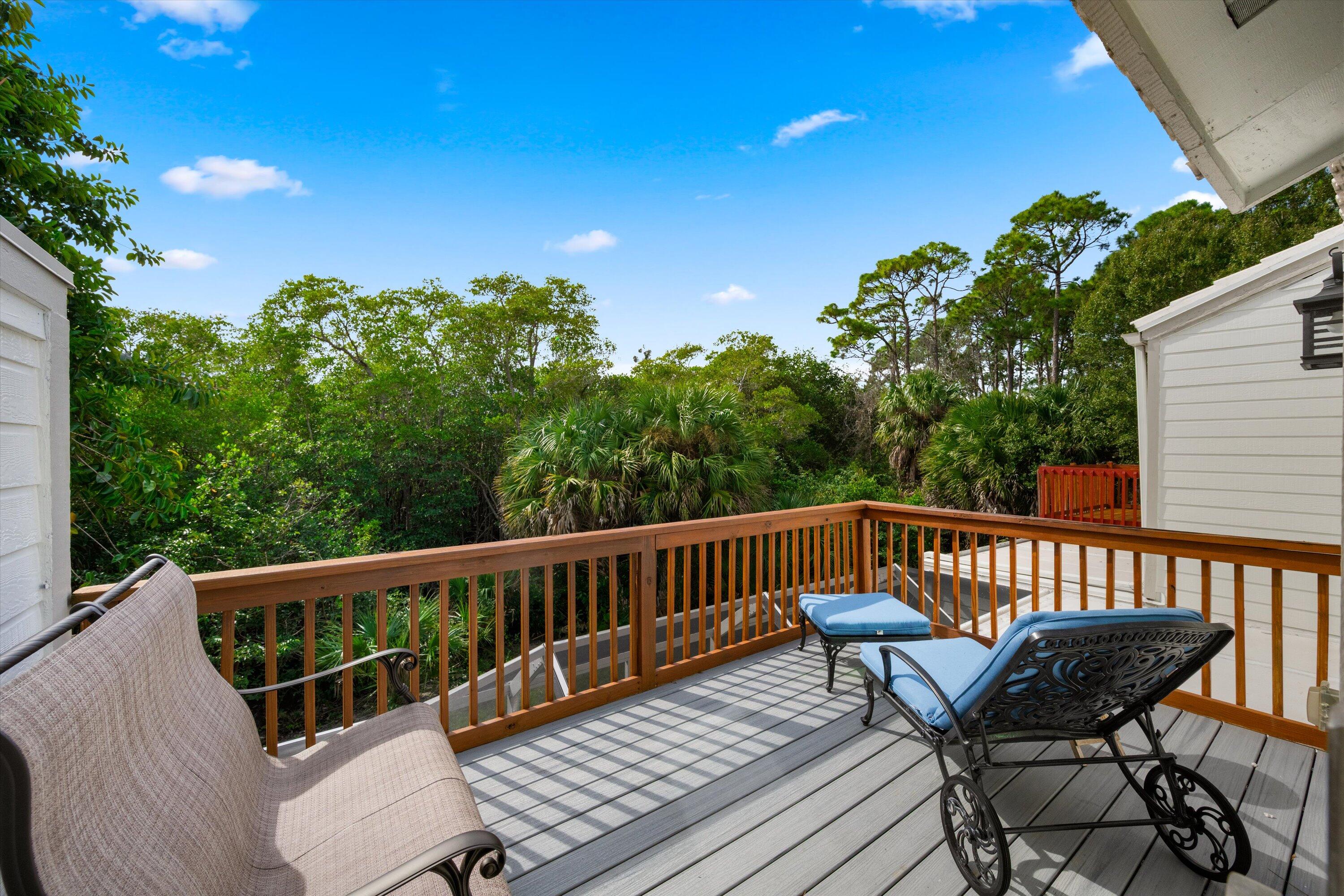 8878 Southeast Riverfront Terrace Jupiter, FL 33469 - Photo 36 of 57 a view of a two chairs on the deck