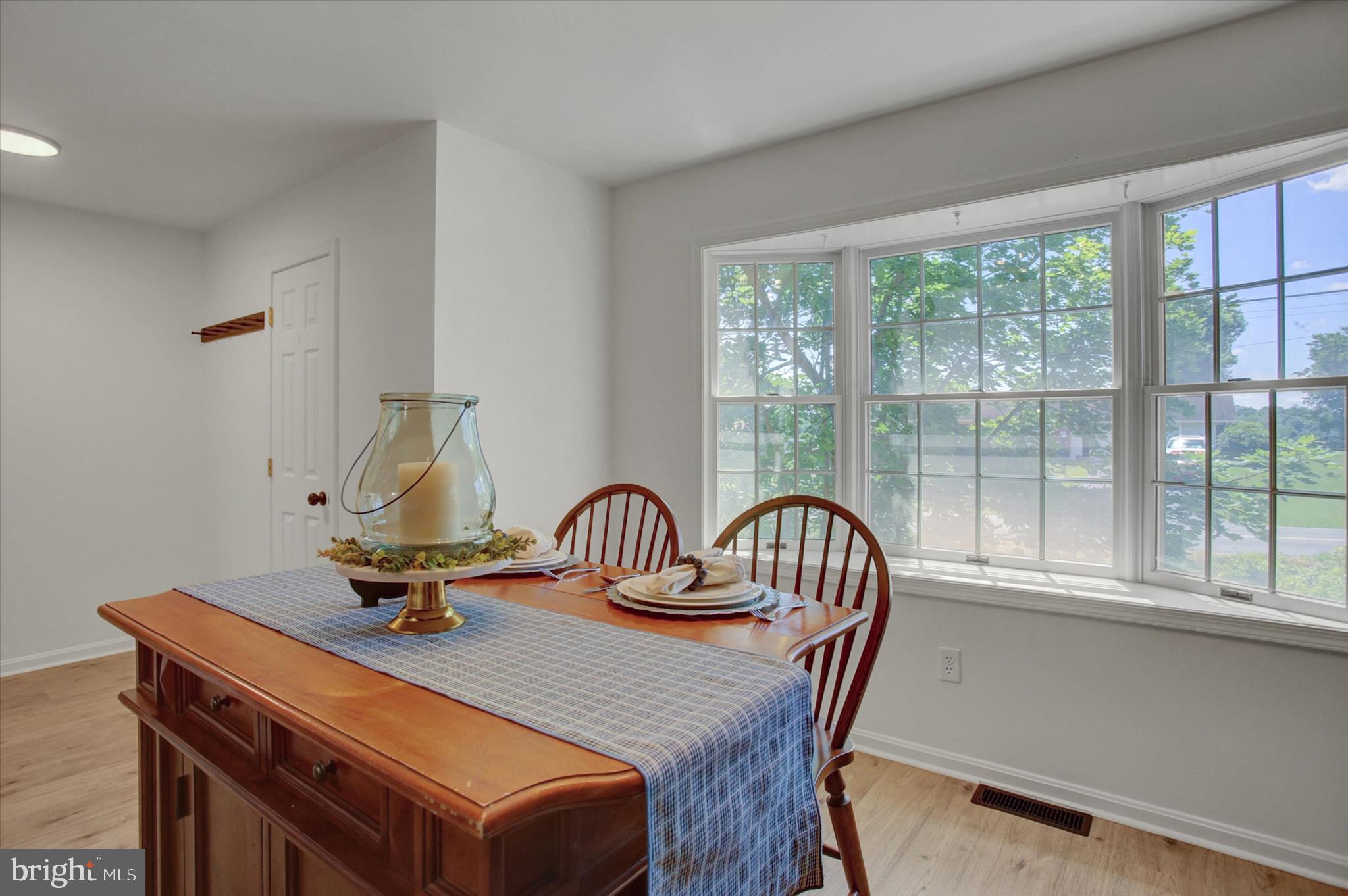 1553 Brechbill Road Chambersburg, PA 17202 - Photo 22 of 45 a view of a dining room with furniture window and outside view
