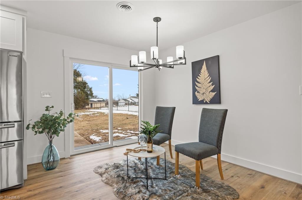 3856 Azalea Lane Trinity, NC 27370 - Photo 11 of 39 Dining space ~ Love all the natural Light!