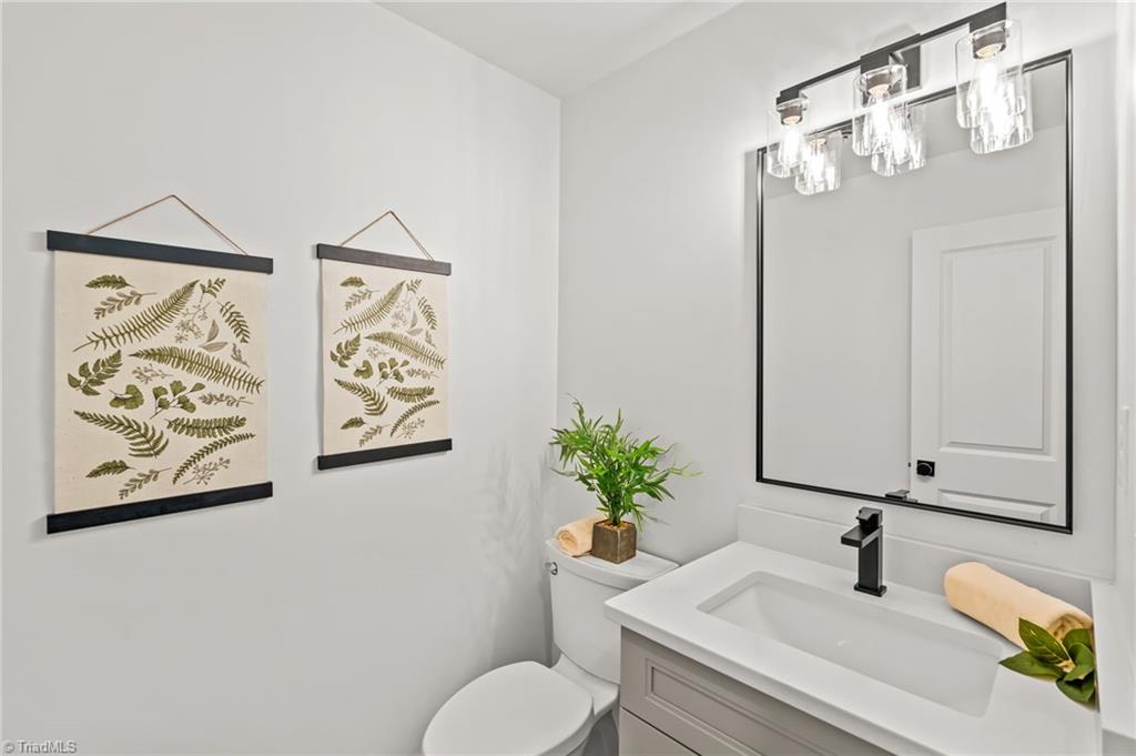 3856 Azalea Lane Trinity, NC 27370 - Photo 17 of 35 Guest Half Bath off the kitchen and living space ~ NEW EVERYTHING!