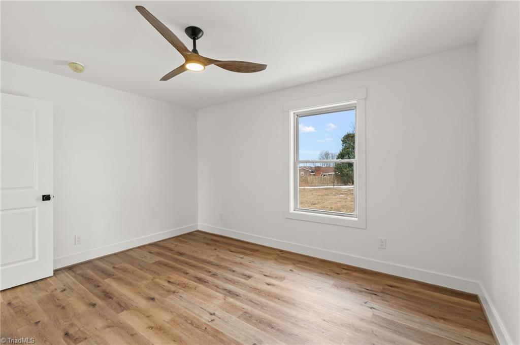 3856 Azalea Lane Trinity, NC 27370 - Photo 26 of 35 Guest bedroom, these fans are stunning!