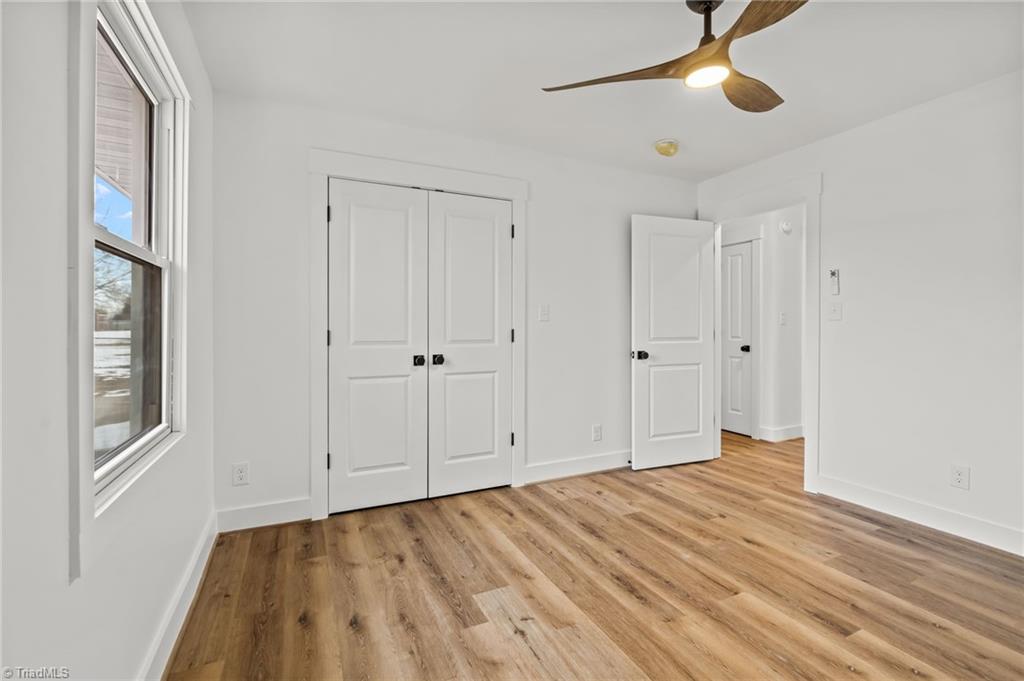 3856 Azalea Lane Trinity, NC 27370 - Photo 33 of 35 Guest bedroom ~ All Fans are designer sleek wood look fans!