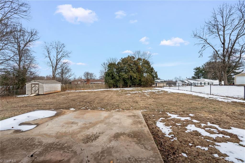 3856 Azalea Lane Trinity, NC 27370 - Photo 35 of 39 Exterior patio + Storage building