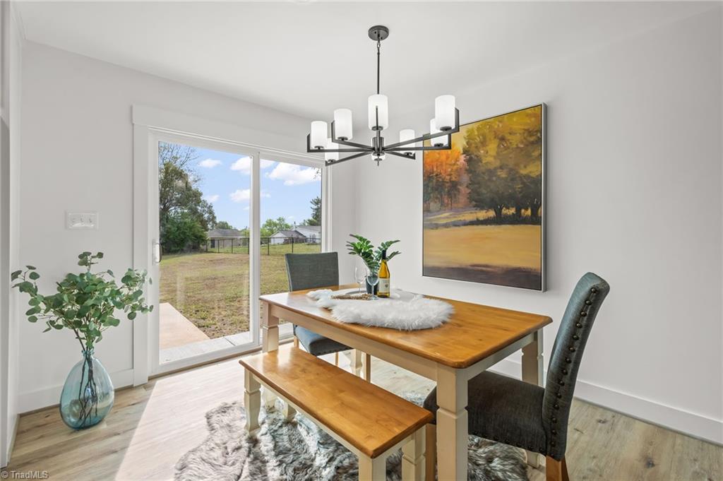 3856 Azalea Lane Trinity, NC 27370 - Photo 10 of 35 Dining space ~ Love all the natural Light!