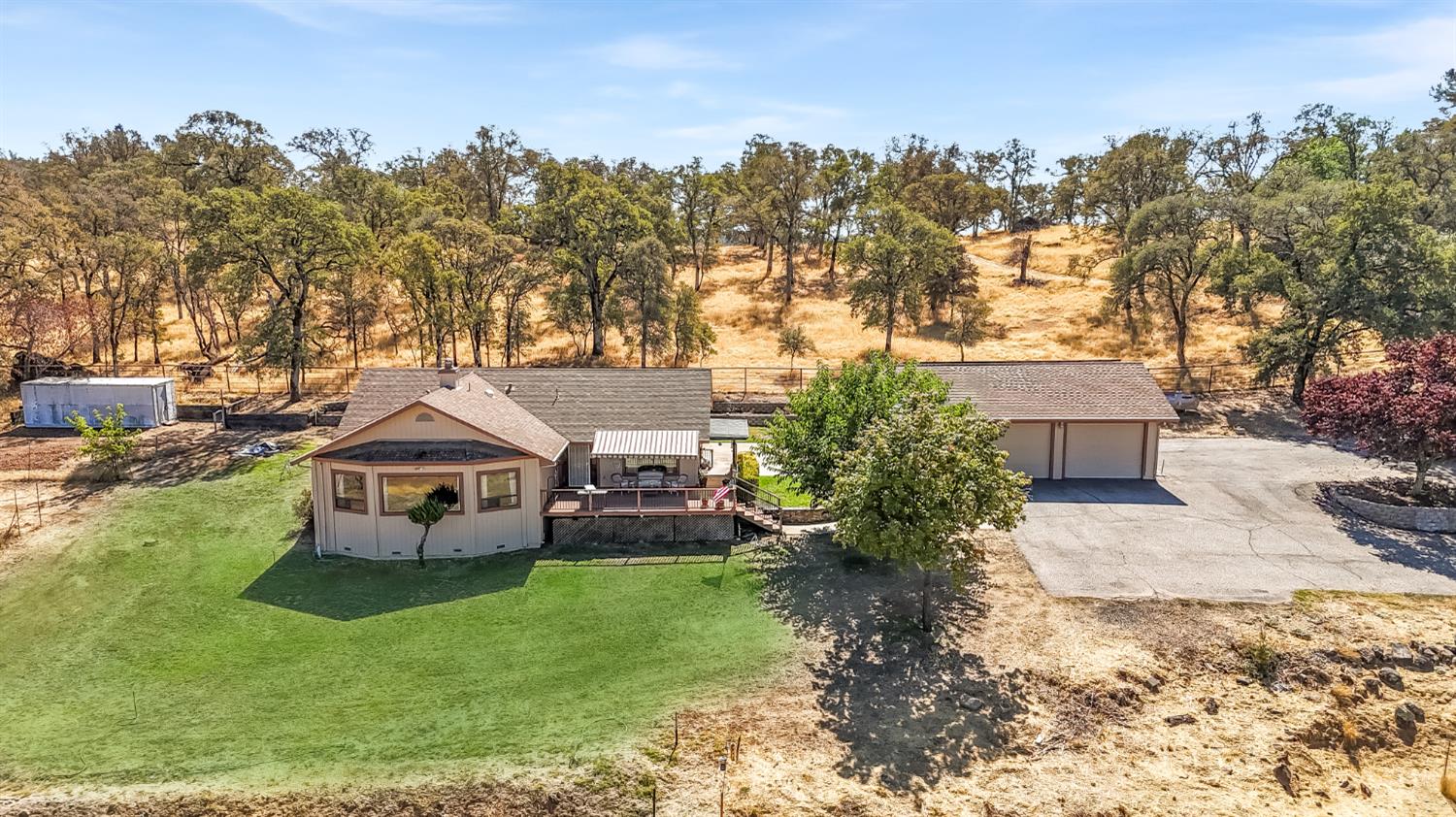 8700 Hubbard Road Auburn, CA 95602 - Photo 1 of 1 View of backyard. grass has been enhanced