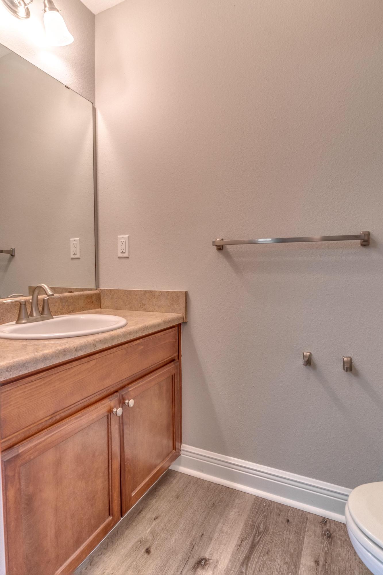 129 Bronze Circle Crestview, FL 32539 - Photo 15 of 31 a bathroom with a sink and a mirror