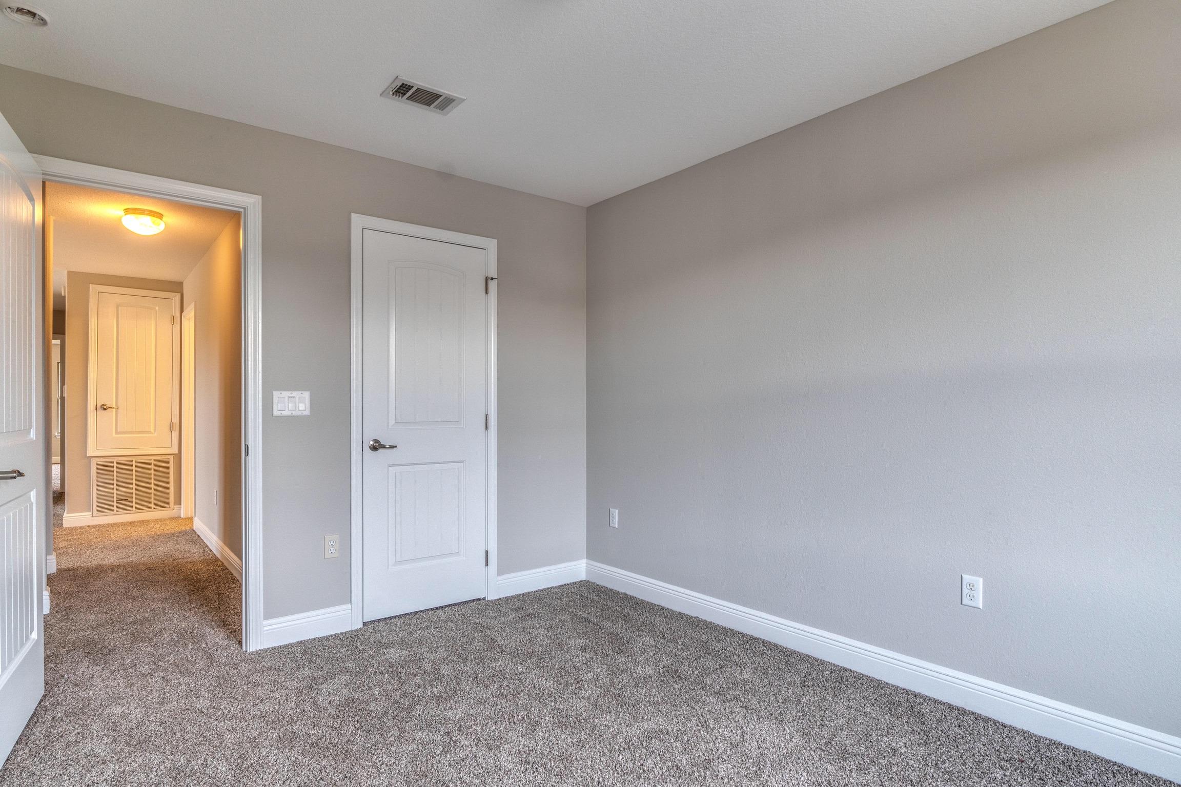 129 Bronze Circle Crestview, FL 32539 - Photo 17 of 31 a view of an empty room and closet area