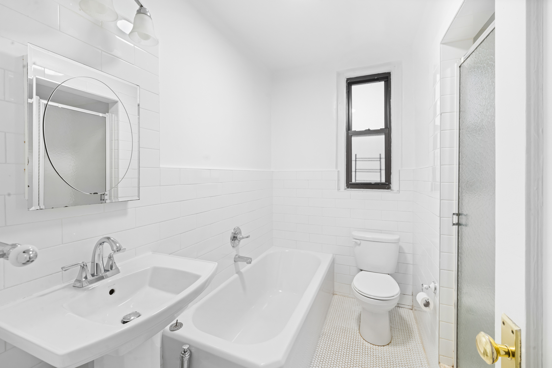 1701 Albemarle Road, Unit B5 Brooklyn, NY 11226 - Photo 13 of 15 a bathroom with a sink and a mirror