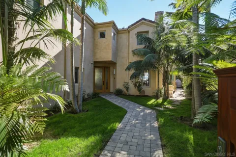 a view of a yard in front of a house