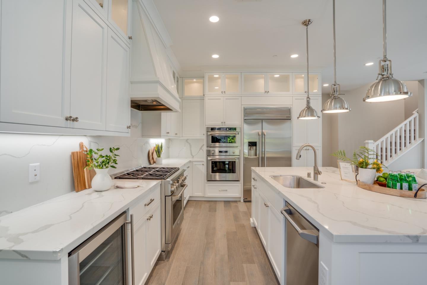 3114 Contreras Drive San Mateo, CA 94403 - Photo 13 of 44 a kitchen with kitchen island a counter top space a sink stainless steel appliances and cabinets