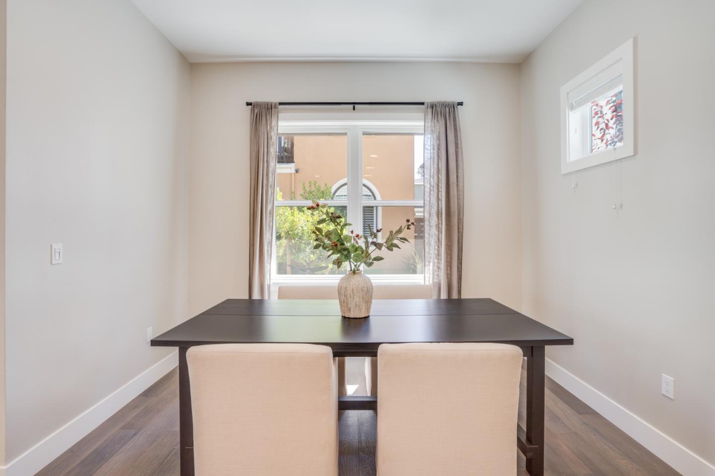 3114 Contreras Drive San Mateo, CA 94403 - Photo 15 of 44 a dining room with table and chairs