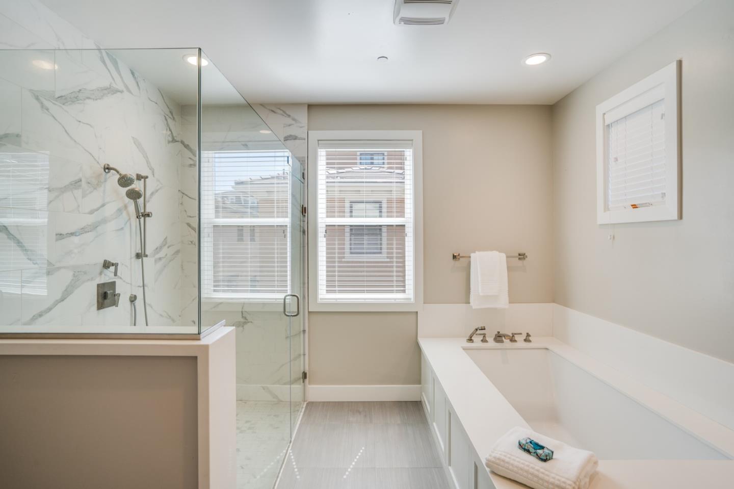 3114 Contreras Drive San Mateo, CA 94403 - Photo 24 of 44 a bathroom with a bathtub and a window