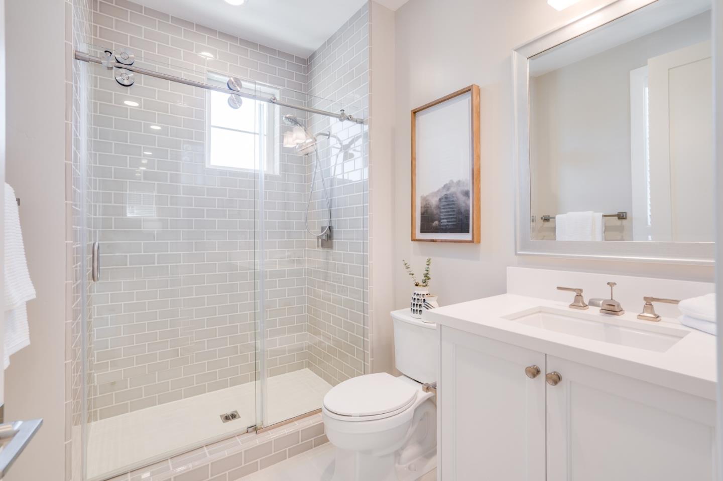3114 Contreras Drive San Mateo, CA 94403 - Photo 39 of 44 a bathroom with a shower sink vanity mirror and toilet