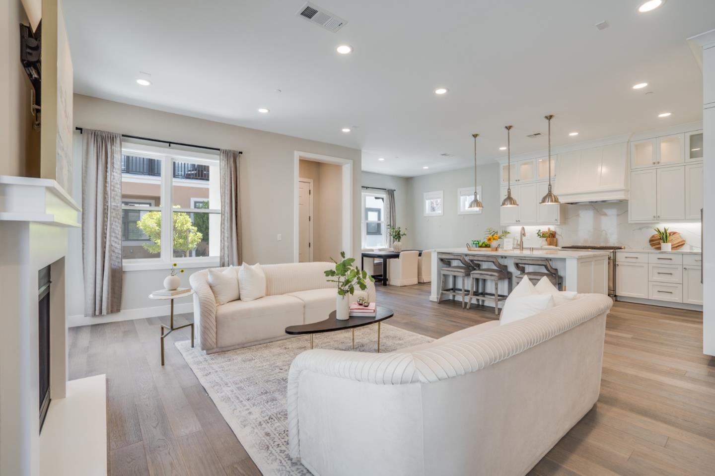 3114 Contreras Drive San Mateo, CA 94403 - Photo 7 of 44 a living room with fireplace furniture and a large window