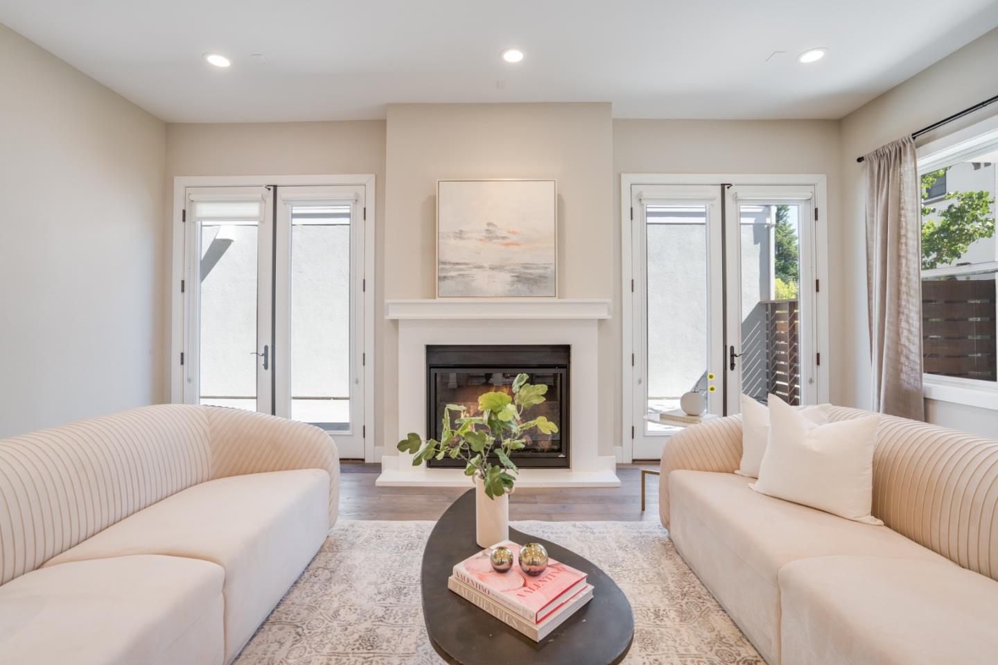 3114 Contreras Drive San Mateo, CA 94403 - Photo 8 of 44 a living room with furniture and a fireplace