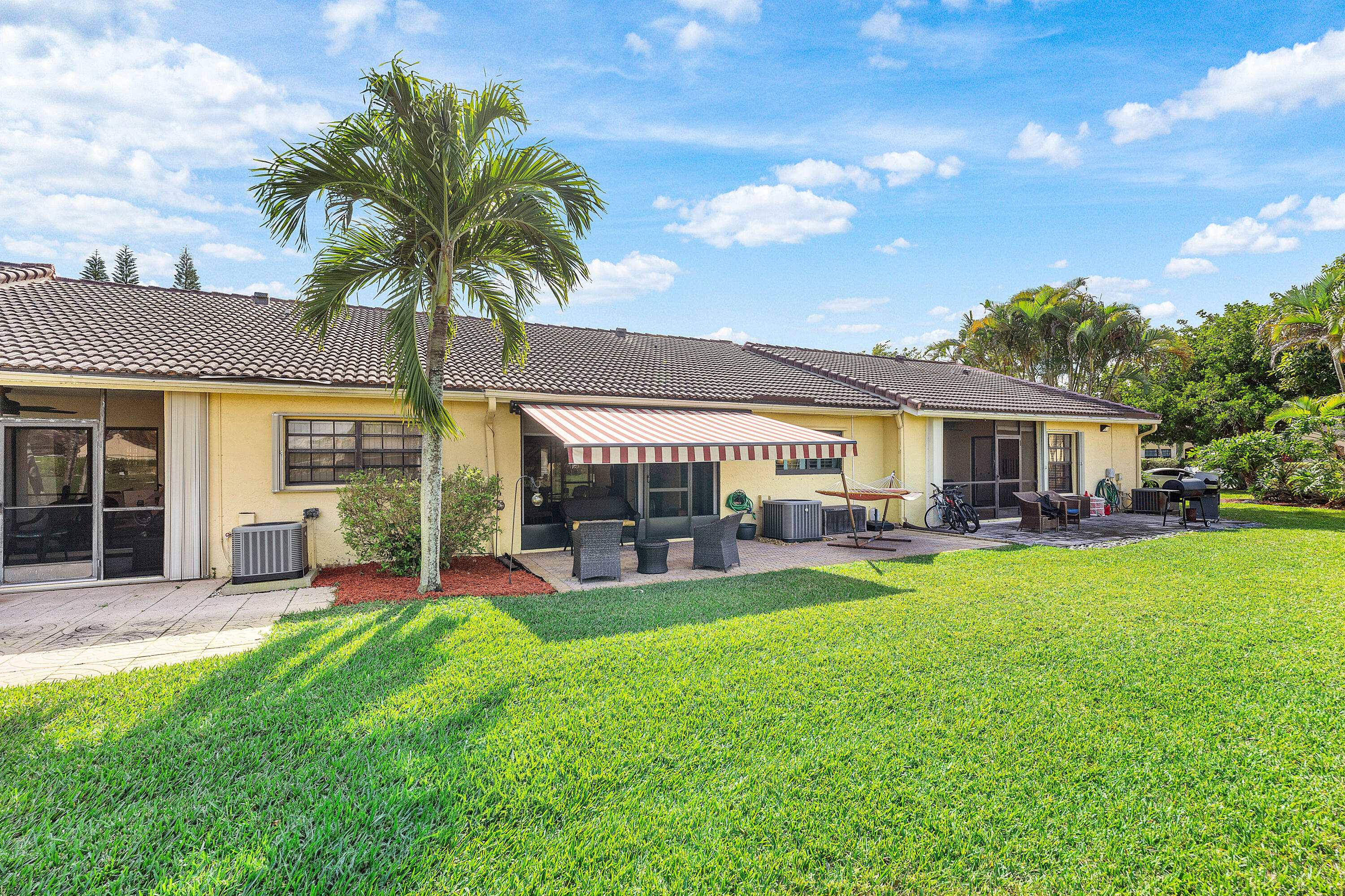 6846 Bridlewood Court Boca Raton, FL 33433 - Photo 4 of 26 Retractable Awning & Huge Paver Patio
