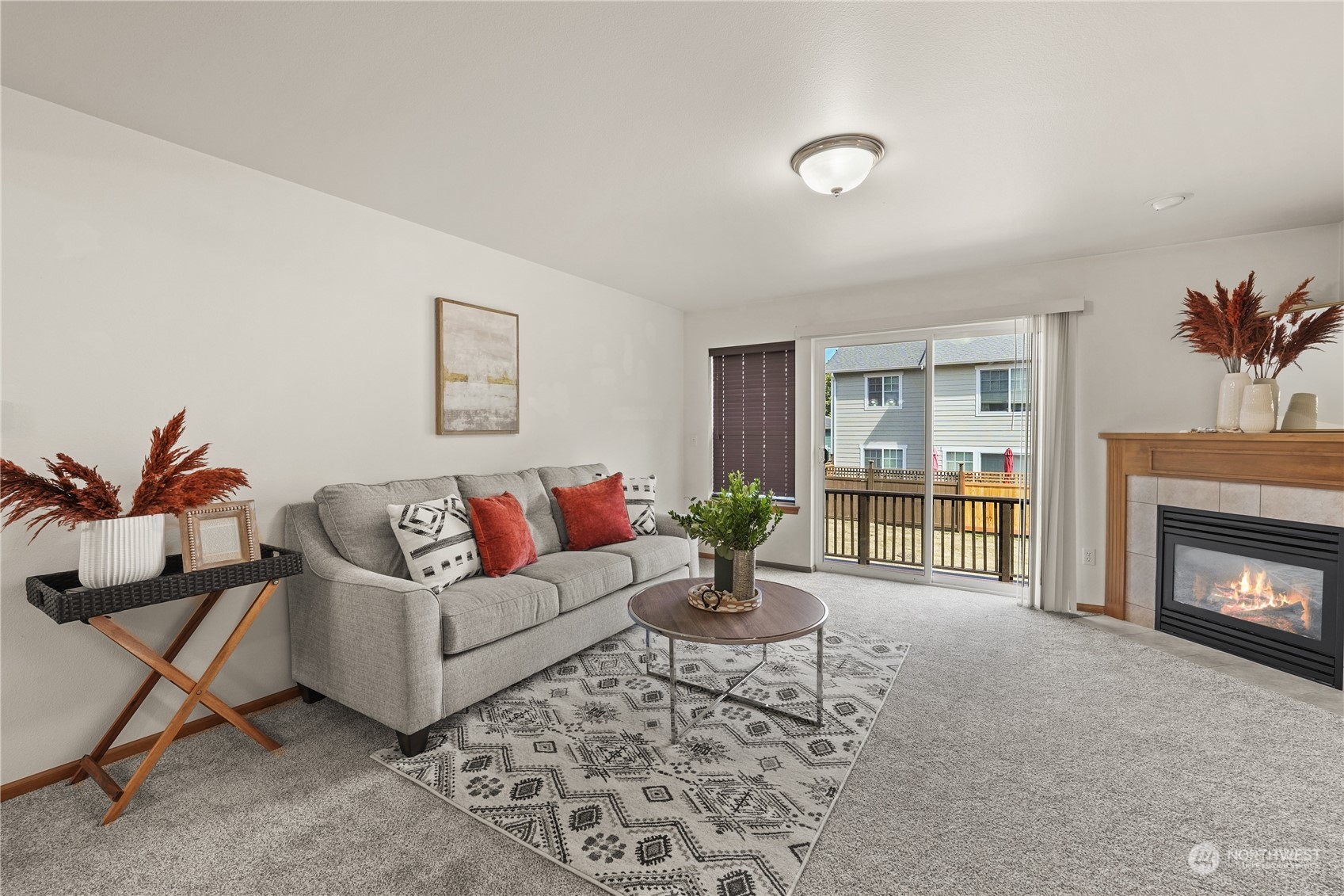 2114 19th Street Anacortes, WA 98221 - Photo 11 of 35 a living room with furniture and a fireplace