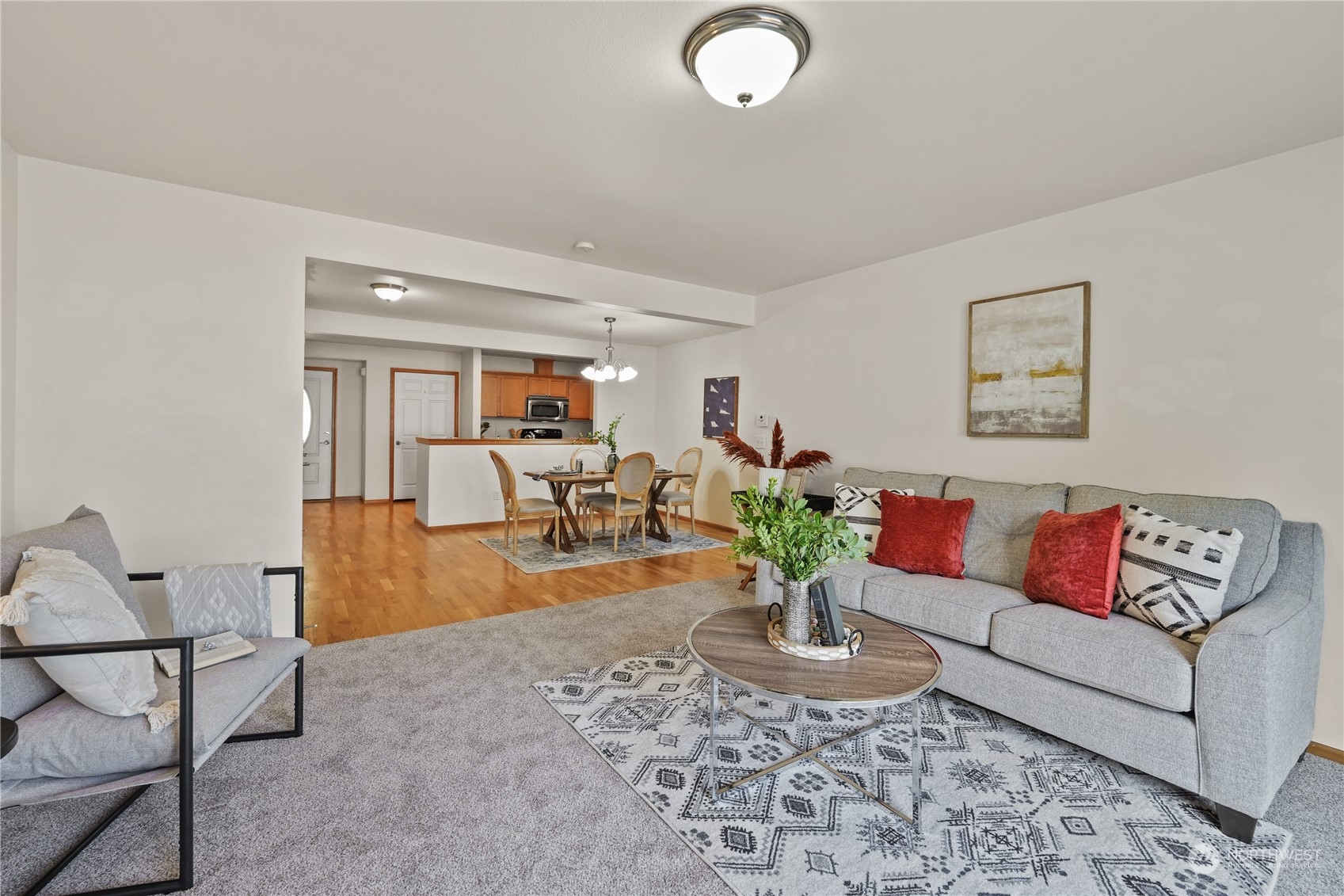 2114 19th Street Anacortes, WA 98221 - Photo 13 of 35 a living room with furniture potted plant and kitchen view