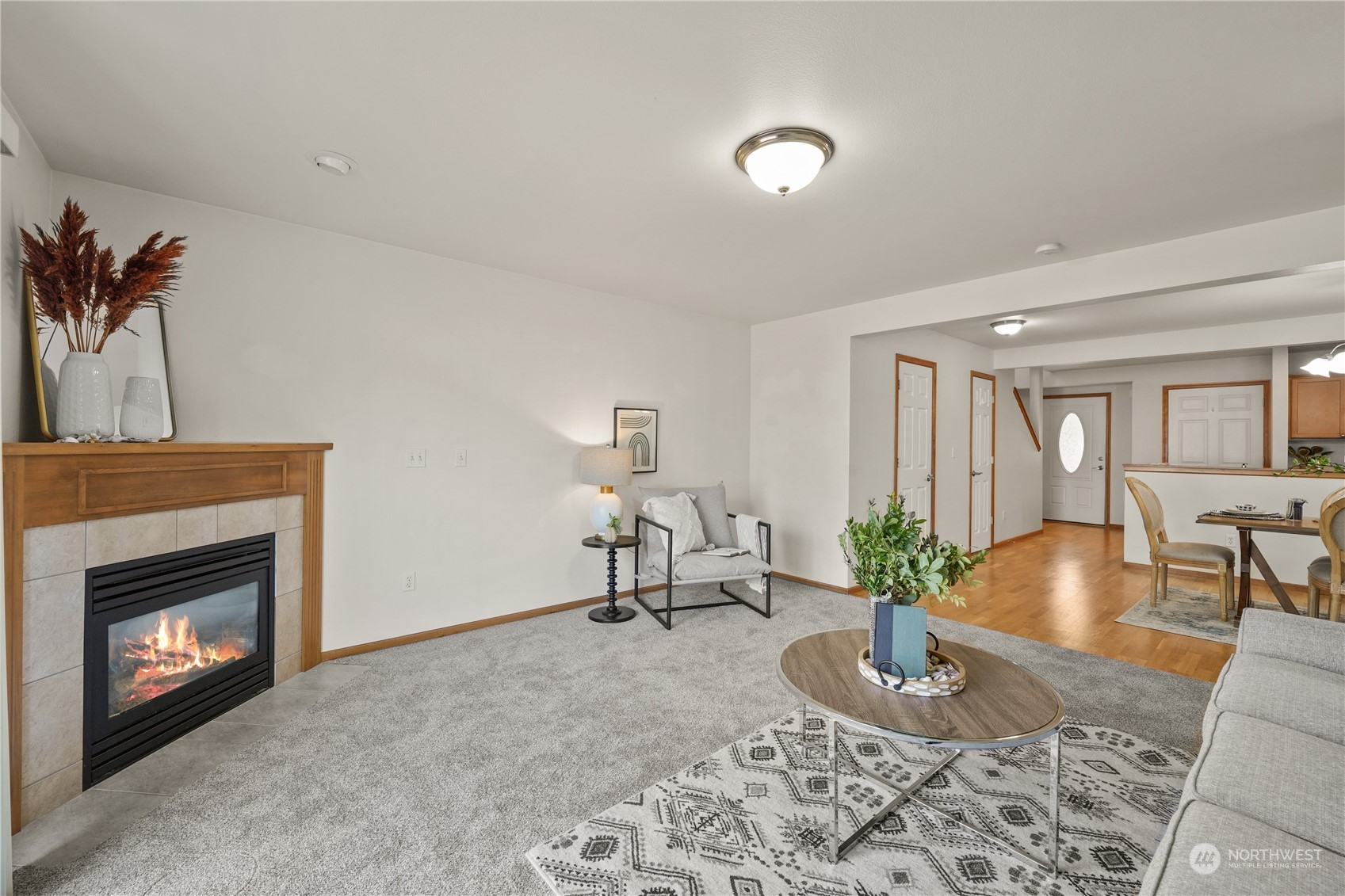 2114 19th Street Anacortes, WA 98221 - Photo 14 of 35 a living room with furniture and a fireplace