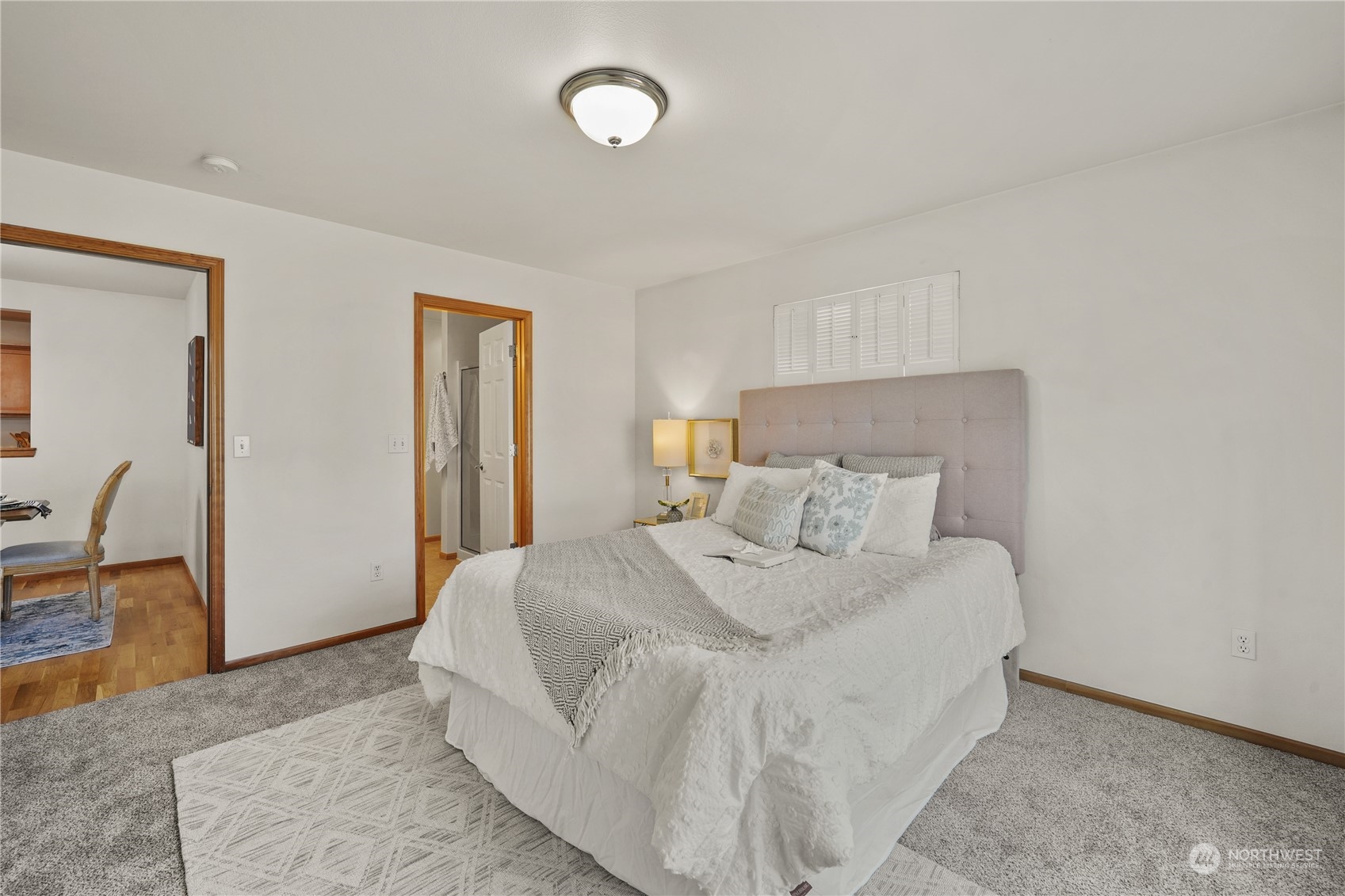 2114 19th Street Anacortes, WA 98221 - Photo 17 of 35 a large white bed in a white room