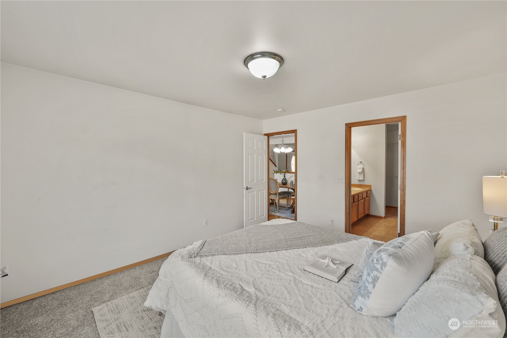 2114 19th Street Anacortes, WA 98221 - Photo 18 of 35 a bedroom with a bed and a window