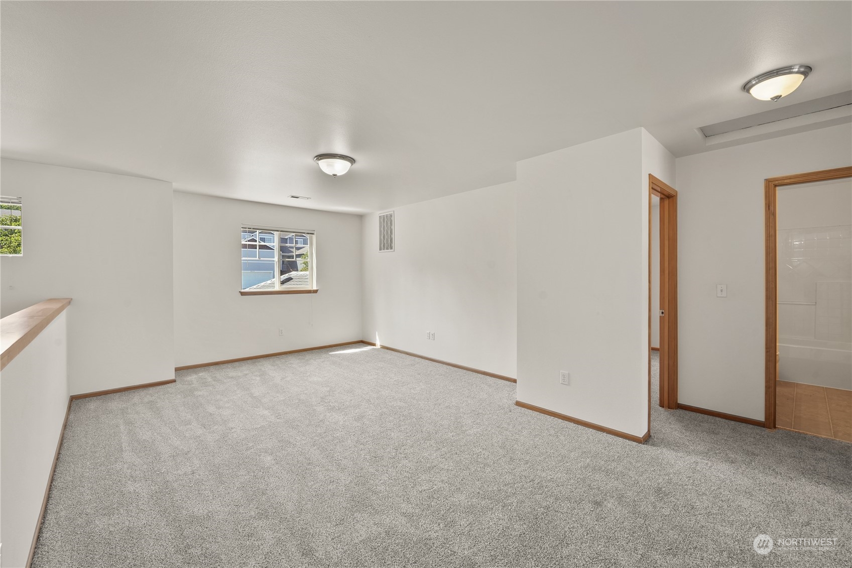 2114 19th Street Anacortes, WA 98221 - Photo 21 of 35 an empty room with windows and closet
