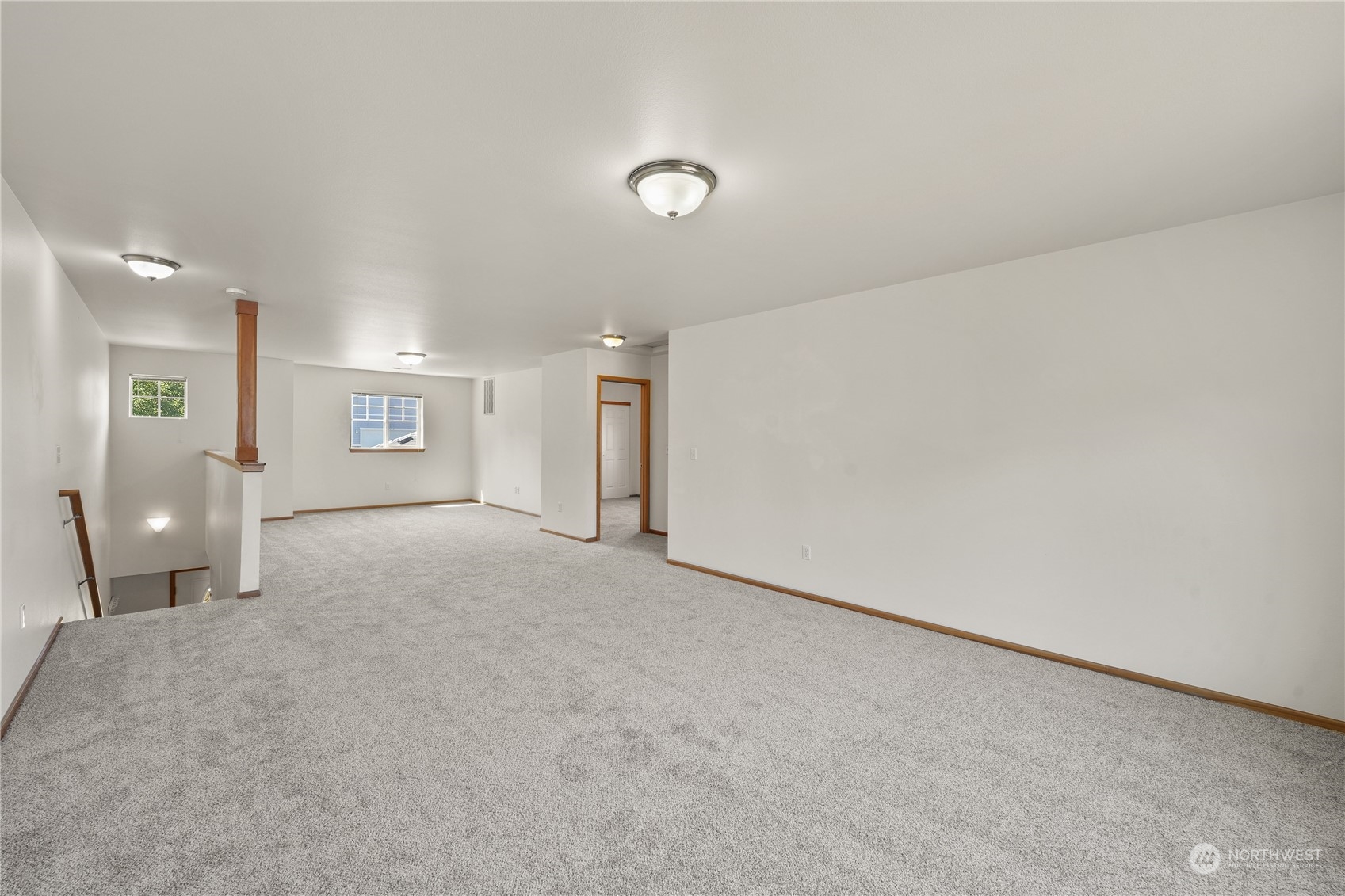 2114 19th Street Anacortes, WA 98221 - Photo 22 of 35 an empty room with a empty space and windows