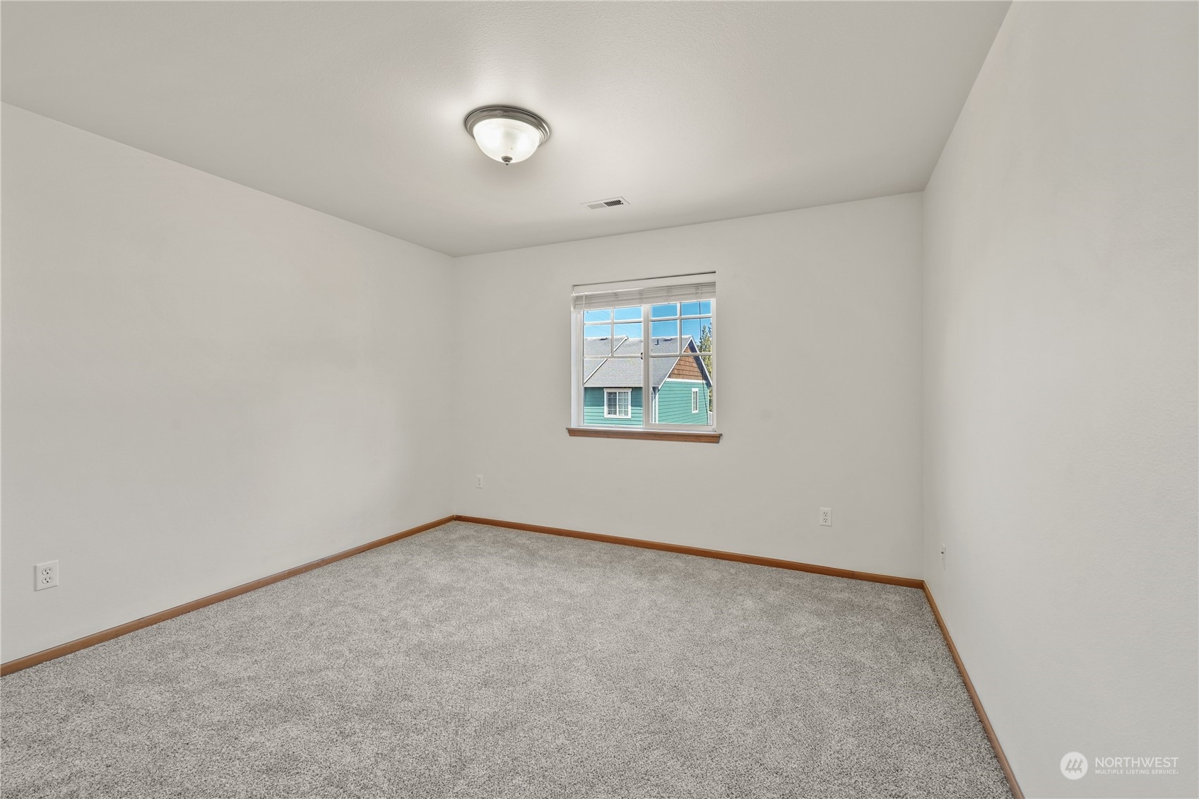 2114 19th Street Anacortes, WA 98221 - Photo 25 of 35 an empty room with a window