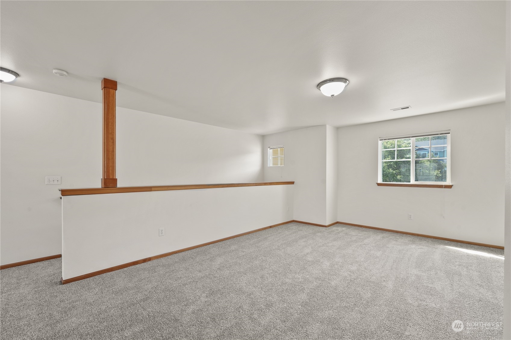 2114 19th Street Anacortes, WA 98221 - Photo 29 of 35 an empty room with windows
