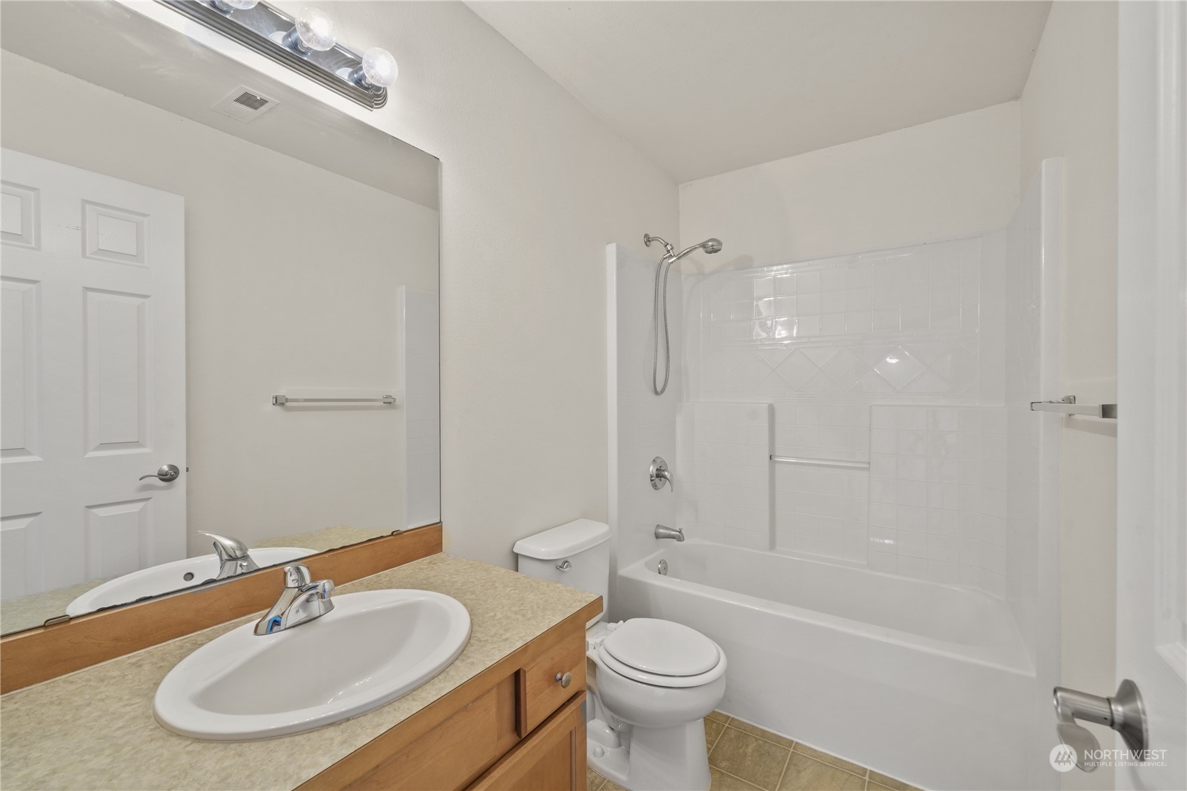2114 19th Street Anacortes, WA 98221 - Photo 30 of 35 a bathroom with a sink a toilet and shower