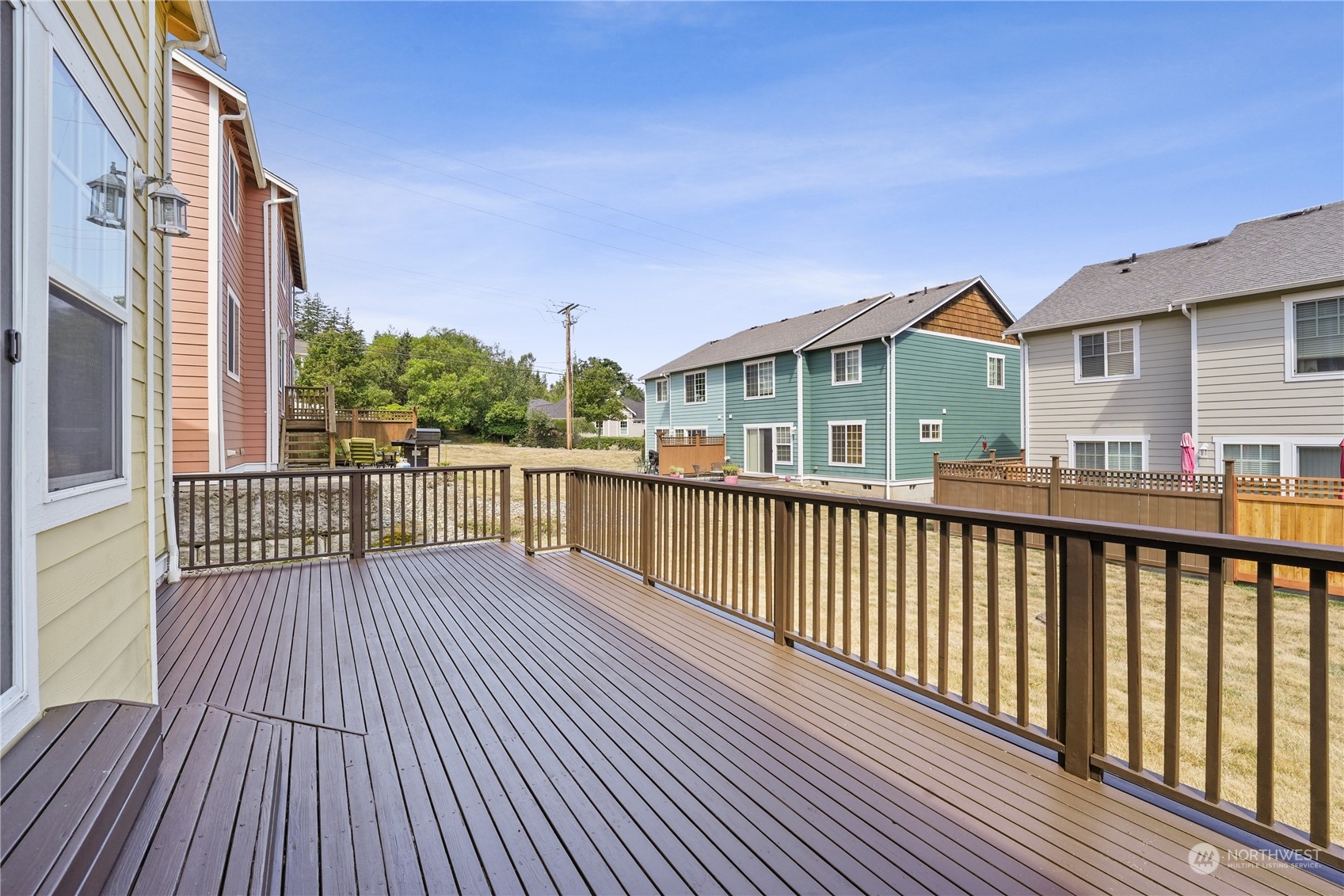 2114 19th Street Anacortes, WA 98221 - Photo 34 of 35 a view of a house with wooden deck