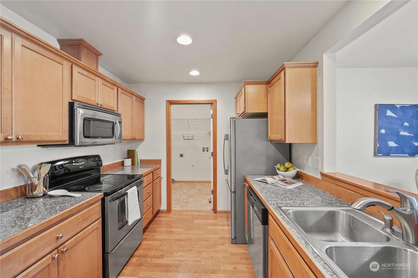 2114 19th Street Anacortes, WA 98221 - Photo 5 of 35 a kitchen that has a sink and a stove in it
