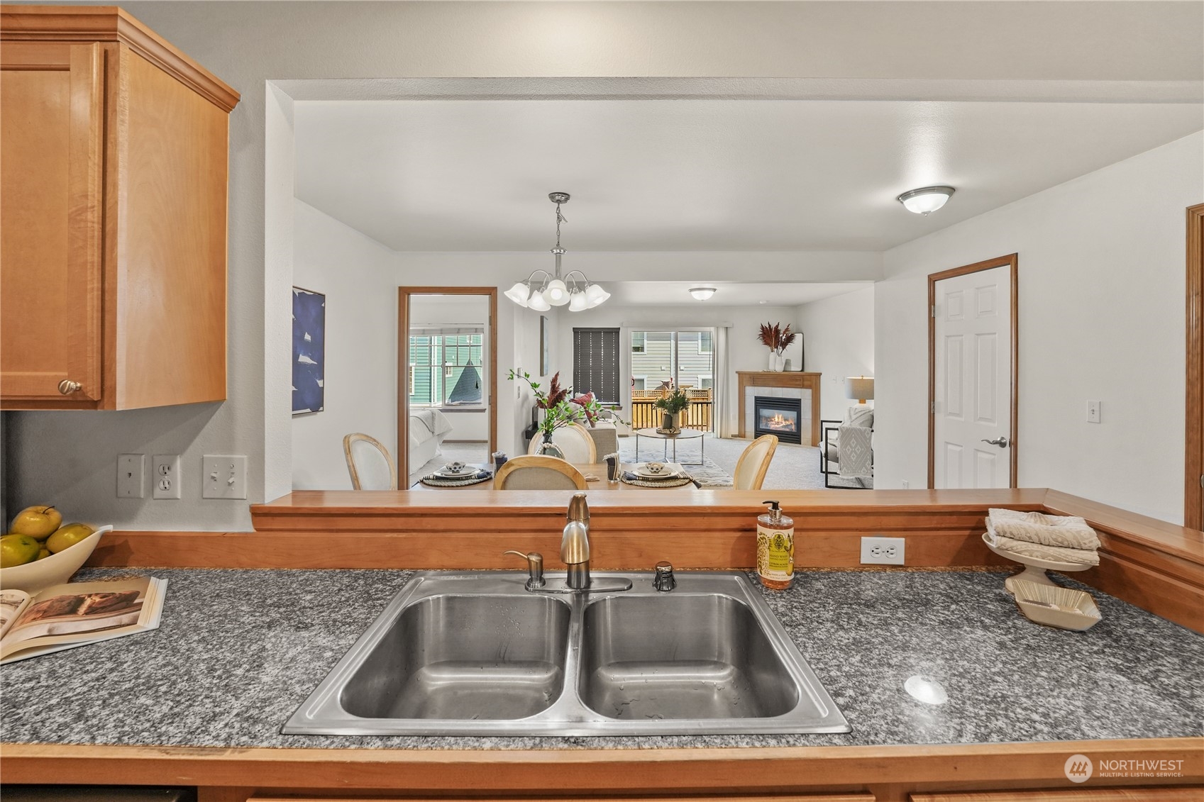 2114 19th Street Anacortes, WA 98221 - Photo 8 of 35 a kitchen with sink refrigerator and cabinets