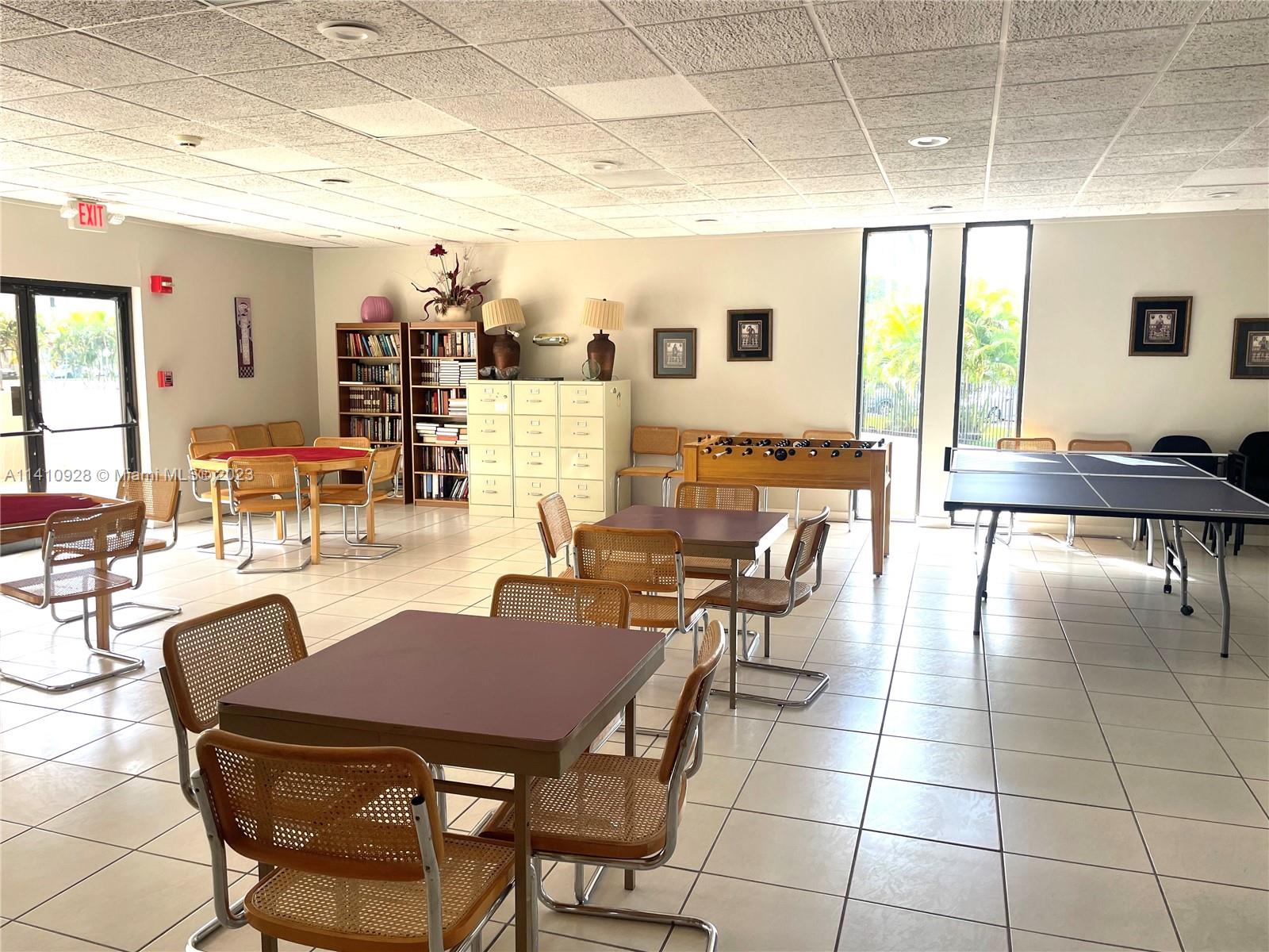 8600 Southwest 133rd Avenue Road, Unit 416 Miami, FL 33183 - Photo 19 of 23 a view of a dining room with furniture