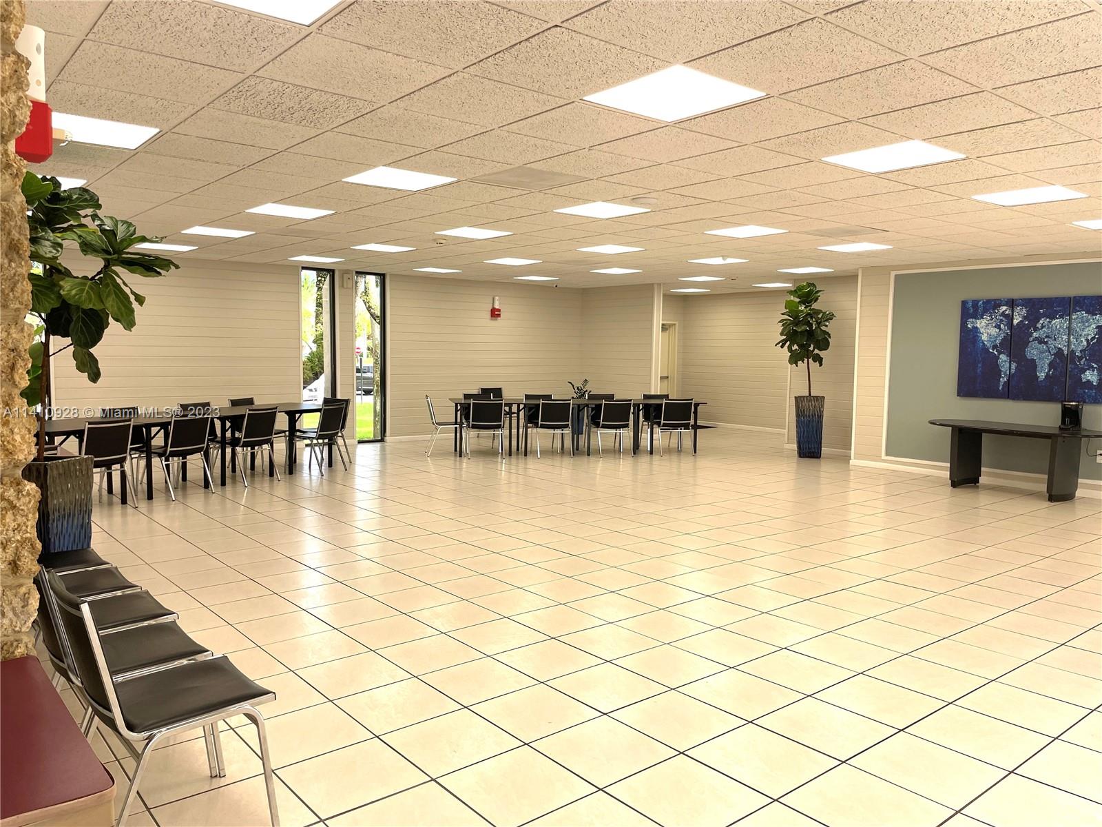8600 Southwest 133rd Avenue Road, Unit 416 Miami, FL 33183 - Photo 21 of 23 a lobby with furniture and a potted plant