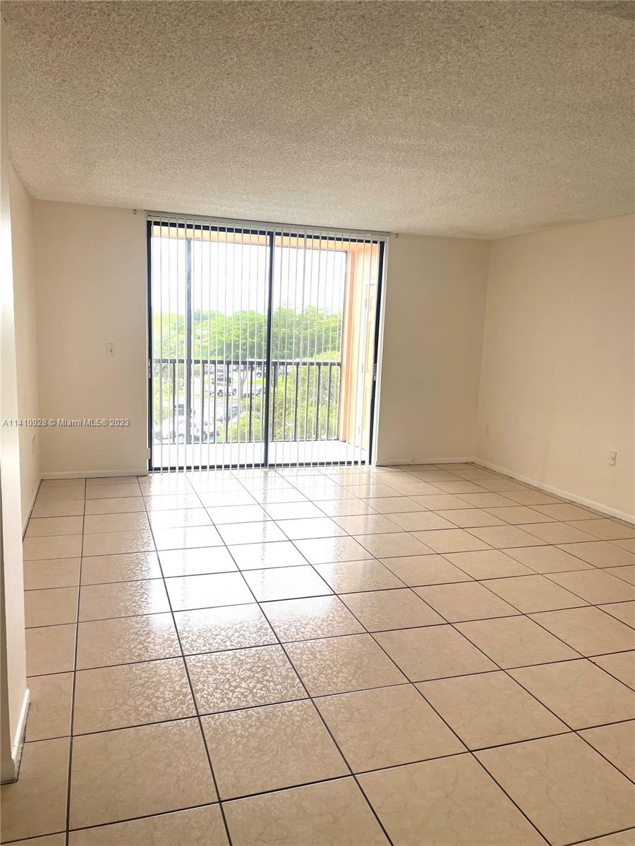 8600 Southwest 133rd Avenue Road, Unit 416 Miami, FL 33183 - Photo 6 of 23 a view of an empty room with a window