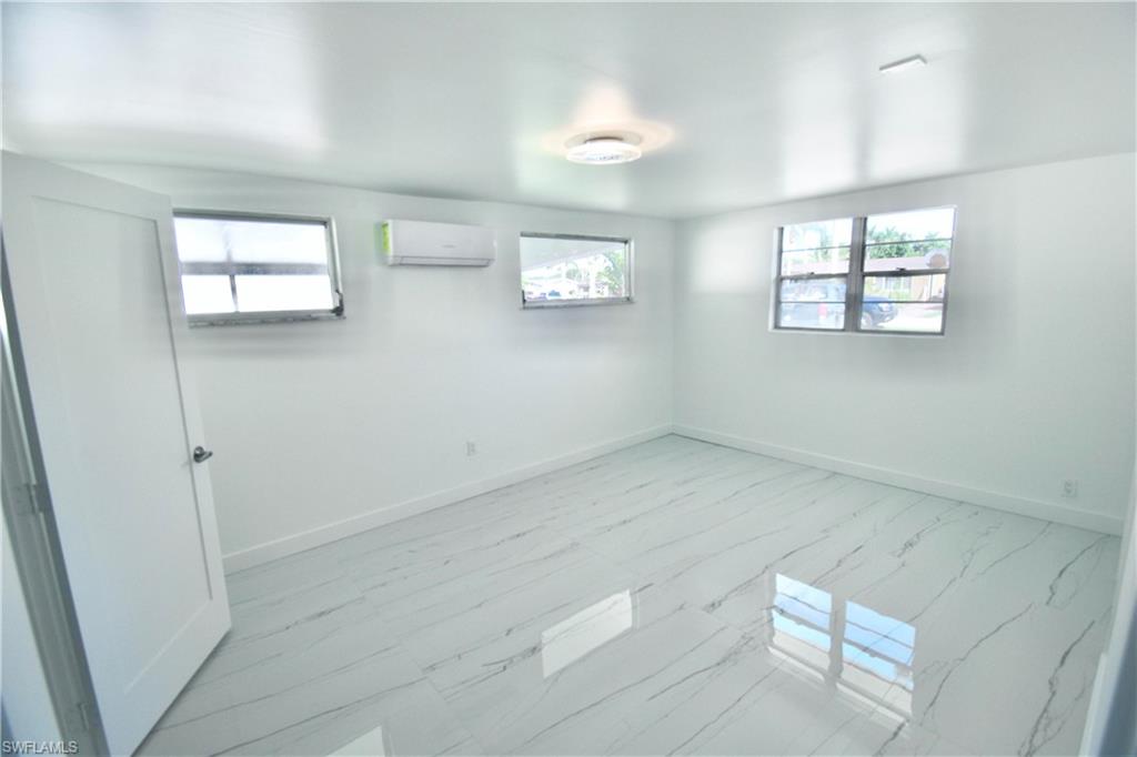 2116 Pineview Road Fort Myers, FL 33901 - Photo 12 of 25 an empty room with windows