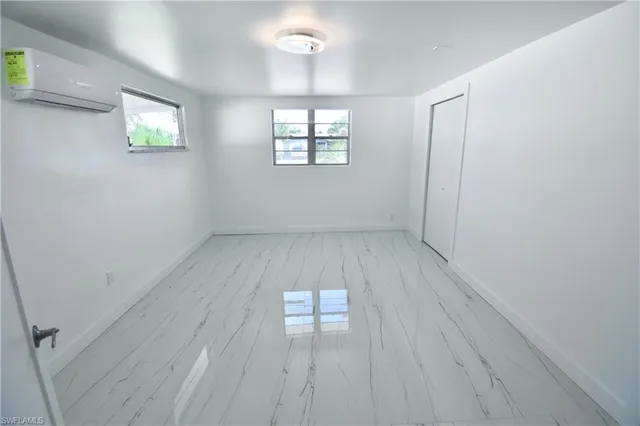 an empty room with windows