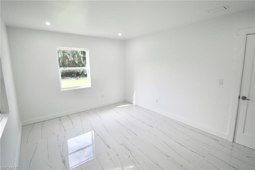 2116 Pineview Road Fort Myers, FL 33901 - Photo 22 of 25 an empty room with a window