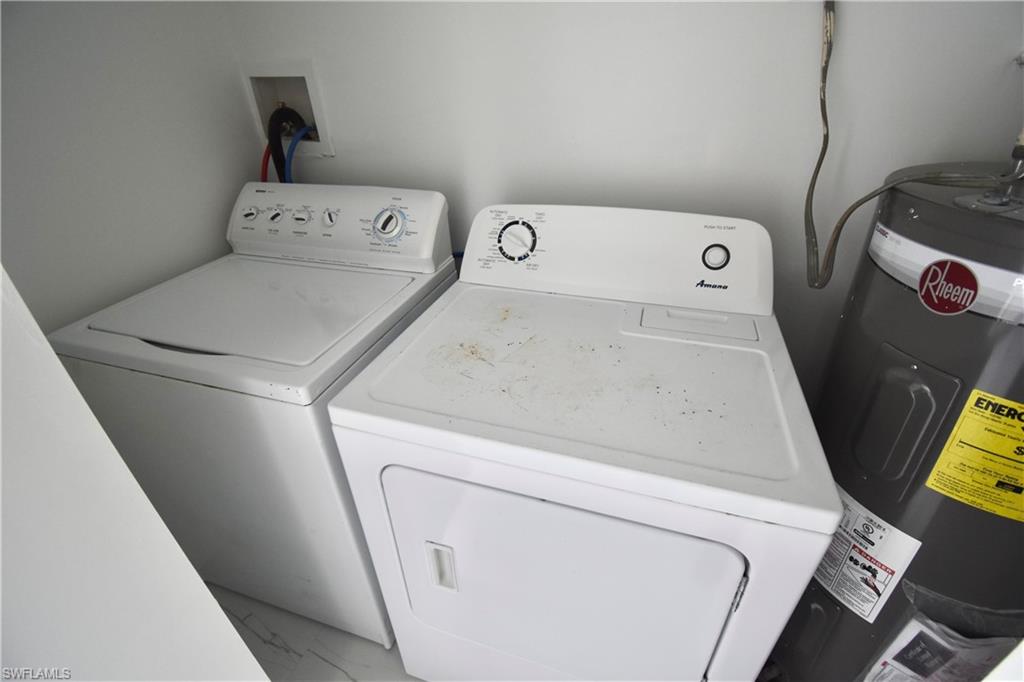 2116 Pineview Road Fort Myers, FL 33901 - Photo 23 of 25 a utility room with dryer and washer